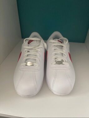 Nike Classic White Sneakers with Red Swoosh